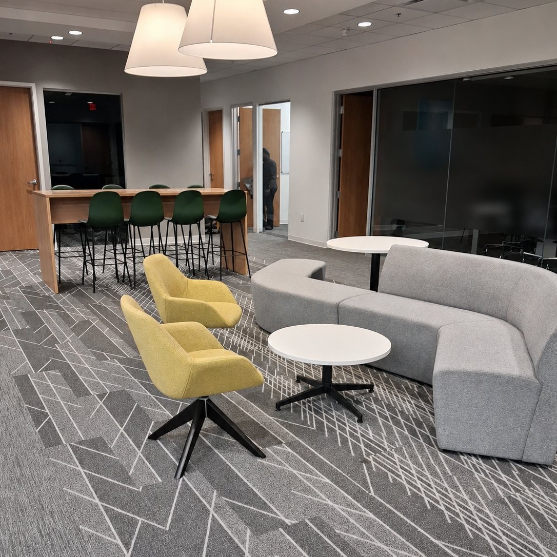 Office lounge seating and breakout tables cleaned as part of the common-area scope